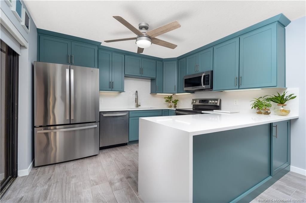 Photo of 6105 SE Windsong Lane, Stuart, FL 34997 (MLS # M20053466)