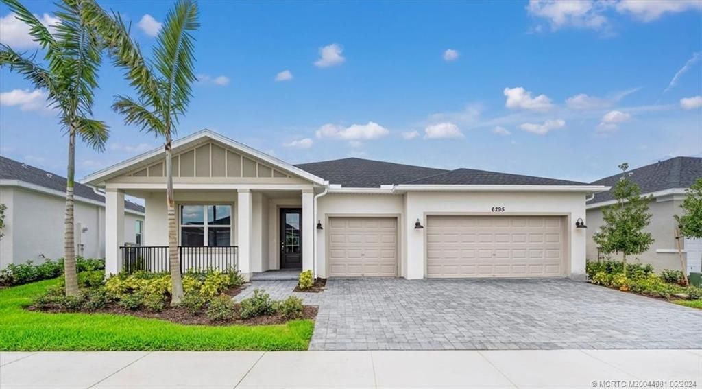 Photo of 6295 NW Sweetwood Drive, Port Saint Lucie, FL 34987 (MLS # M20044881)