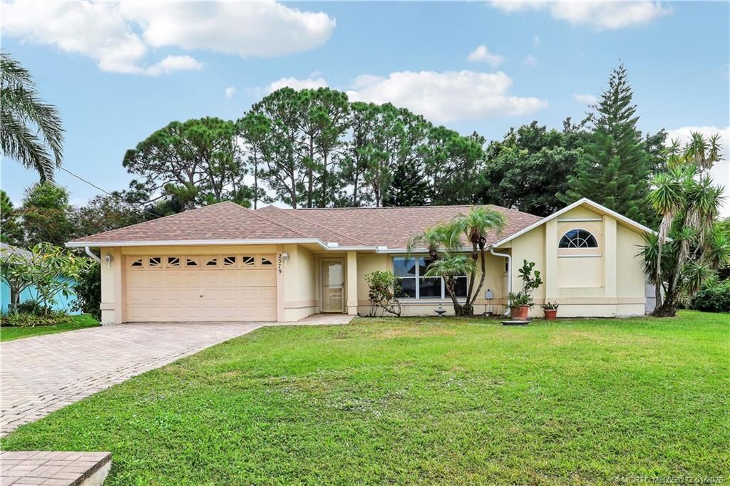 Photo of 2579 SE Leithgow Street, Port Saint Lucie, FL 34952 (MLS # M20053272)