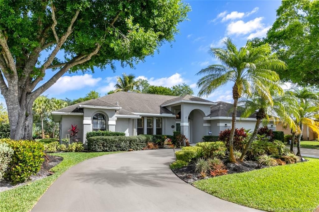 Photo of 1837 SW Hunters Club Way, Palm City, FL 34990 (MLS # M20038621)