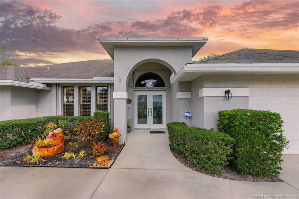 Photo of 1837 SW Hunters Club Way, Palm City, FL 34990 (MLS # M20038621)
