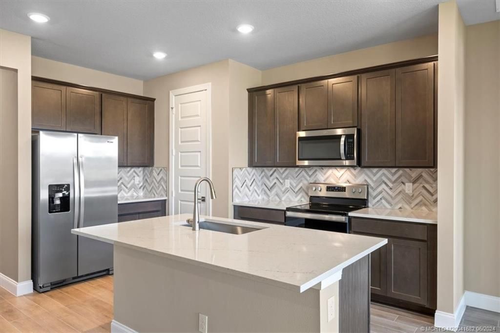 Photo of 8667 Dahlia Circle, Port Saint Lucie, FL 34986 (MLS # M20041682)