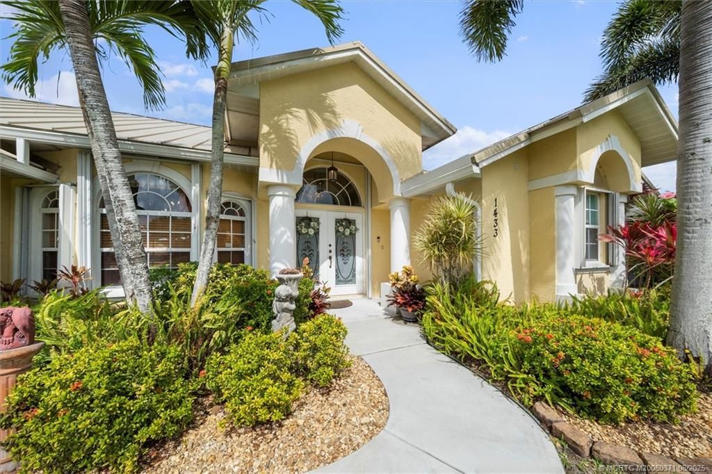 Photo of 1433 SW Devera Avenue, Port Saint Lucie, FL 34953 (MLS # M20050371)