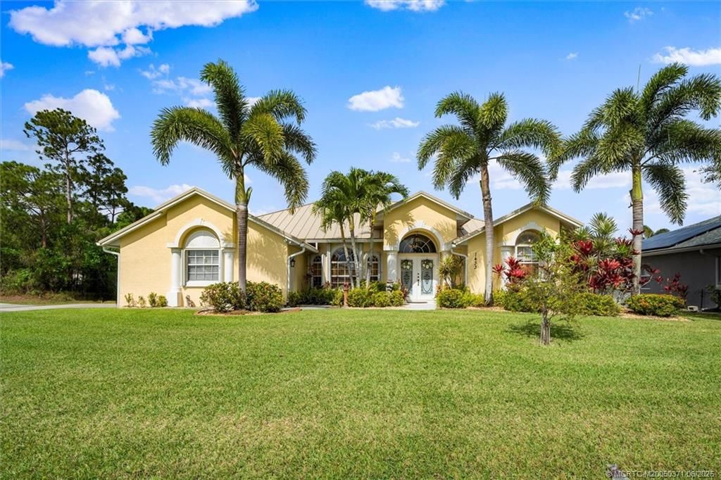 Photo of 1433 SW Devera Avenue, Port Saint Lucie, FL 34953 (MLS # M20050371)