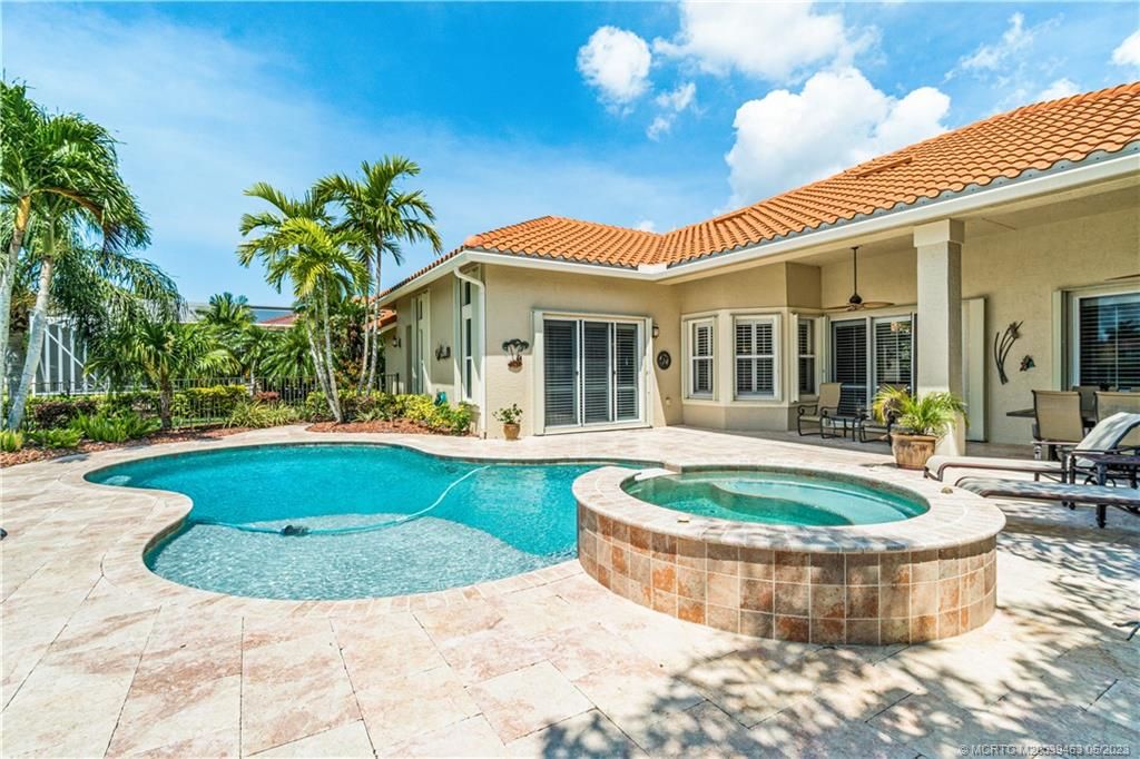 Photo of 2254 SW Dove Canyon Way, Palm City, FL 34990 (MLS # M20039463)