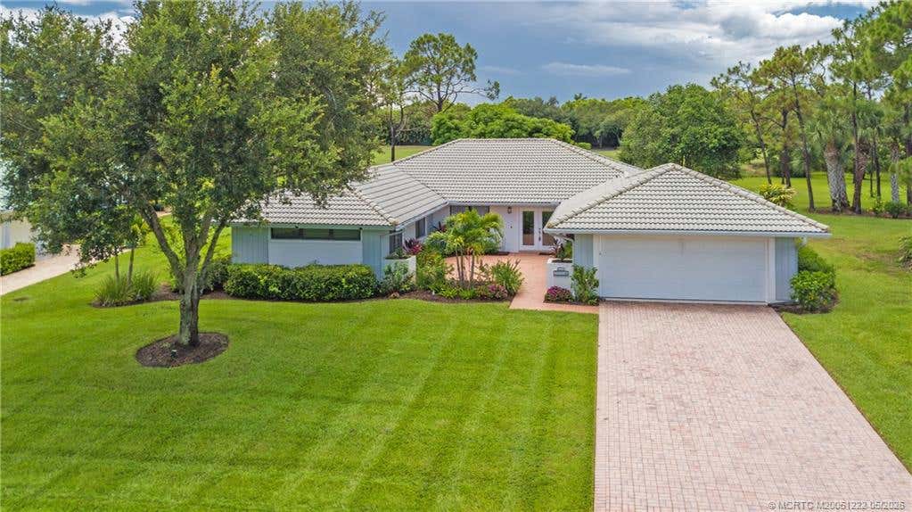Photo of 1463 SW Troon Circle, Palm City, FL 34990 (MLS # M20051222)