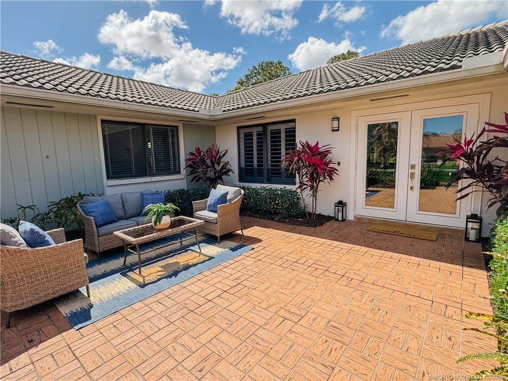 Photo of 1463 SW Troon Circle, Palm City, FL 34990 (MLS # M20051222)