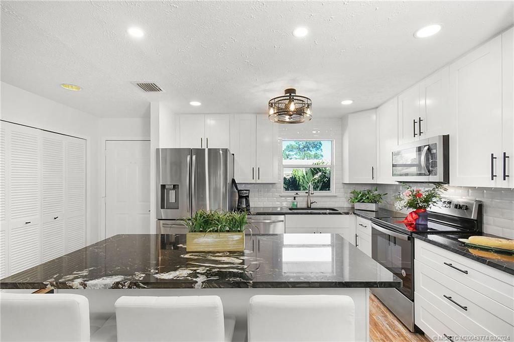 Photo of 2950 SE Ocean Boulevard #122-6, Stuart, FL 34996 (MLS # M20043774)