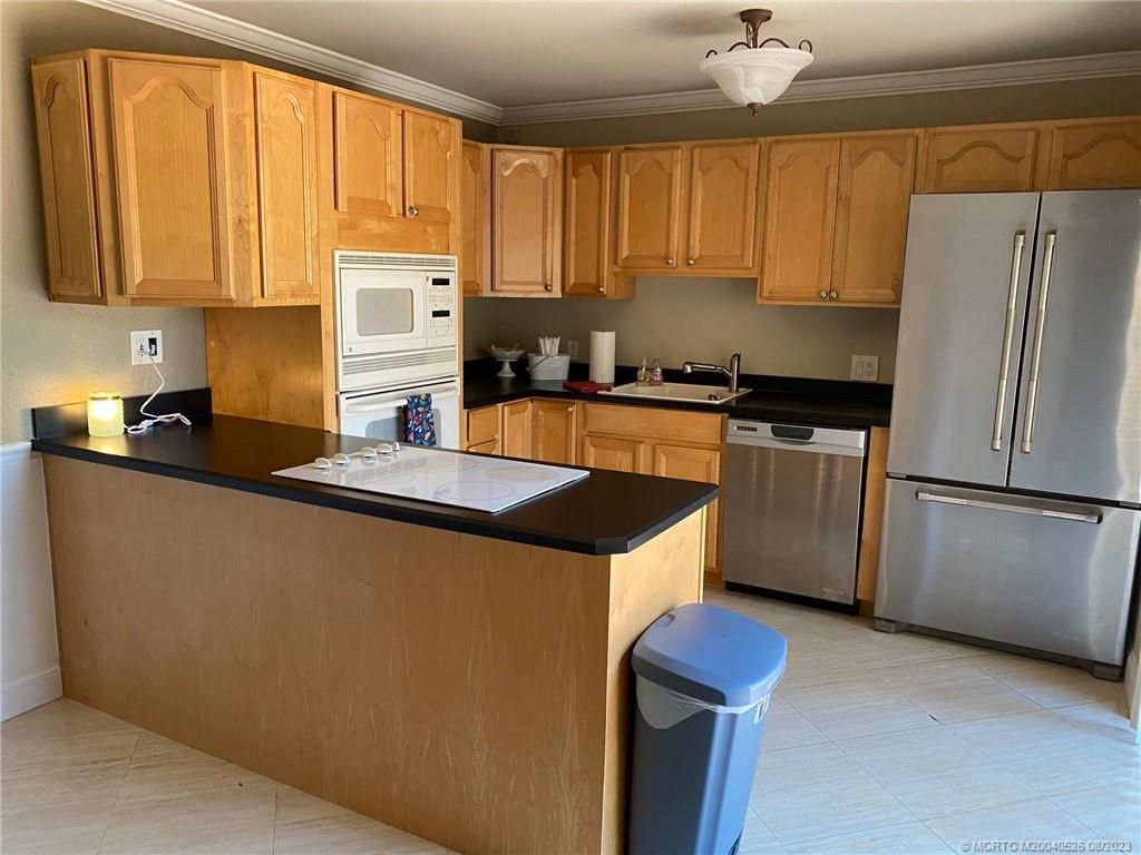 Photo of 5698 SE Windsong Lane, Stuart, FL 34997 (MLS # M20040526)