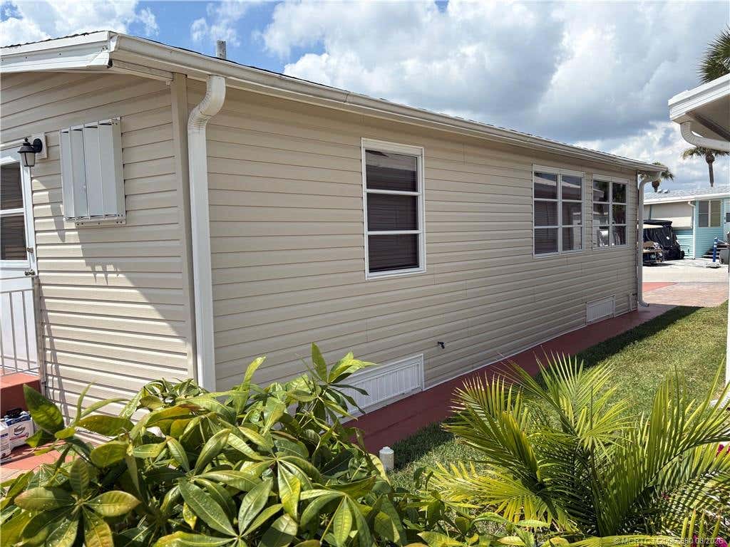Photo of 122 Nettles Boulevard, Jensen Beach, FL 34957 (MLS # M20056680)