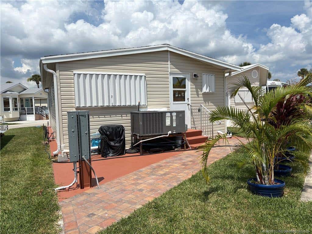 Photo of 122 Nettles Boulevard, Jensen Beach, FL 34957 (MLS # M20056680)