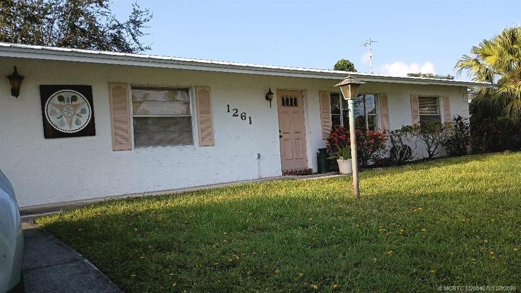 Photo of 1261 SE Mendavia Avenue, Port Saint Lucie, FL 34952 (MLS # M20040701)