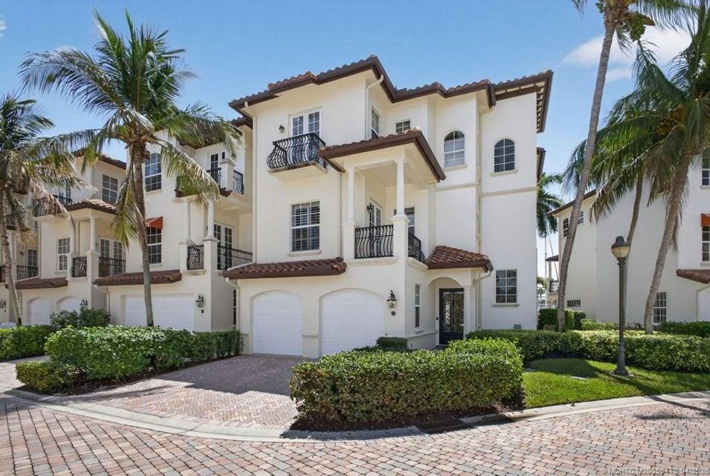 Photo of 24 Marina Gardens Drive, Palm Beach Gardens, FL 33410 (MLS # M20055470)
