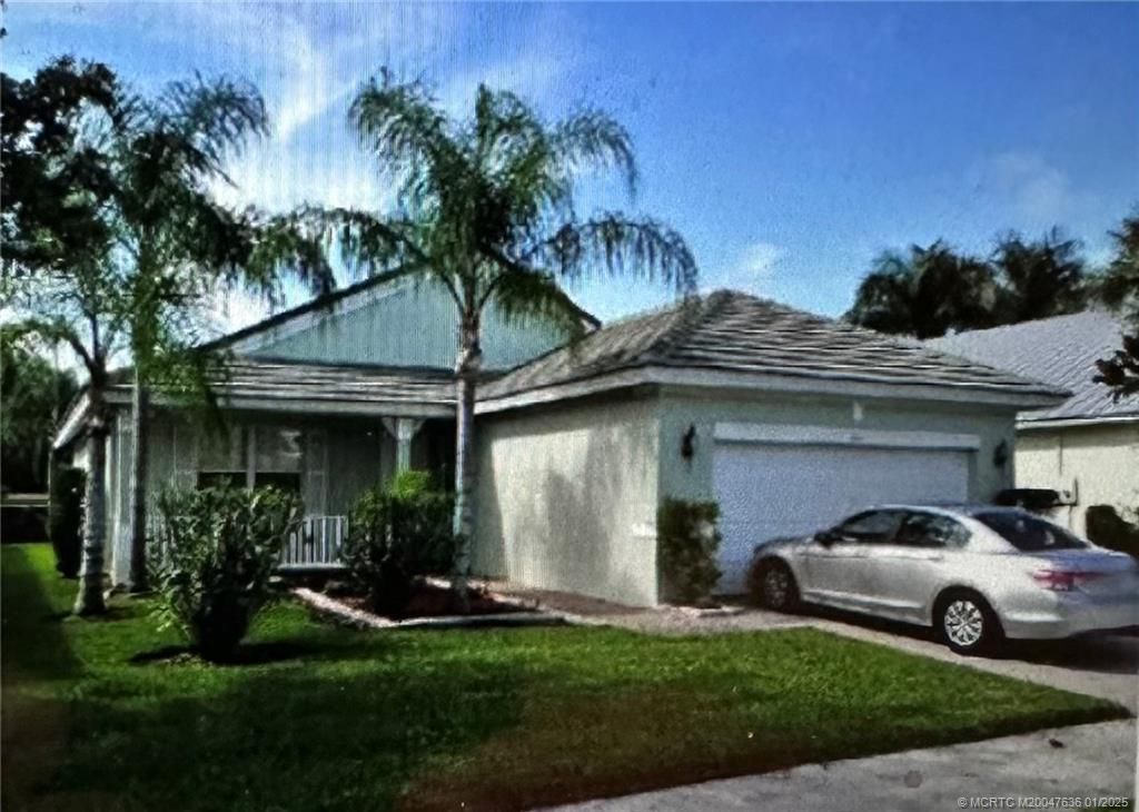 Photo of 185 NW Willow Grove Avenue, Port Saint Lucie, FL 34986 (MLS # M20047636)