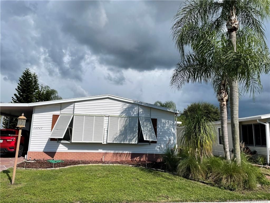 Photo of 14347 SW Golf Club Drive, Indiantown, FL 34956 (MLS # M20052344)