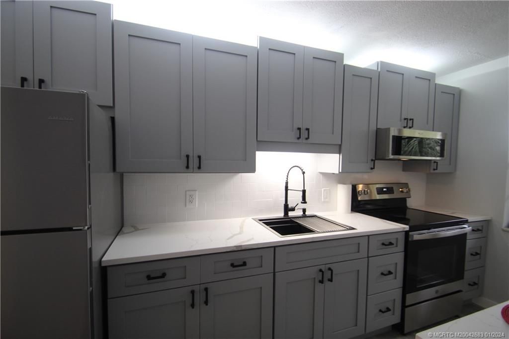 Photo of 1081 SE Monterey Road #c-24, Stuart, FL 34994 (MLS # M20042683)