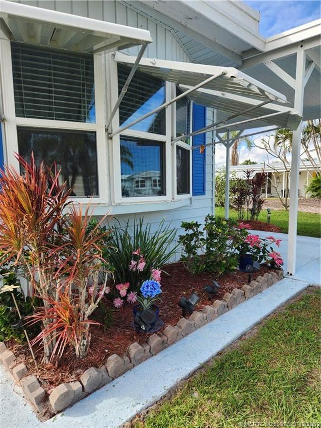 Photo of 14 El Portal Lane, Port Saint Lucie, FL 34952 (MLS # M20037311)