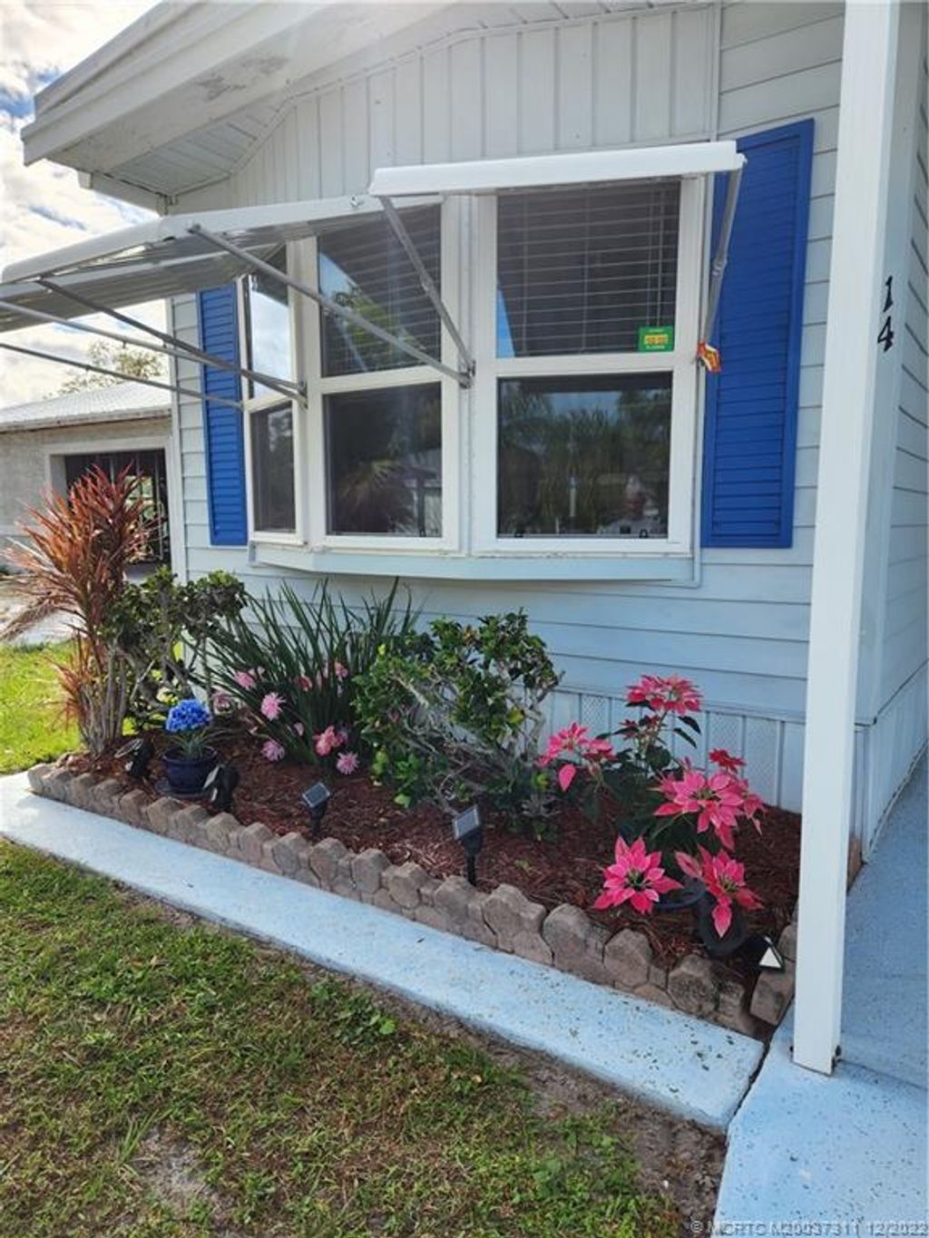 Photo of 14 El Portal Lane, Port Saint Lucie, FL 34952 (MLS # M20037311)