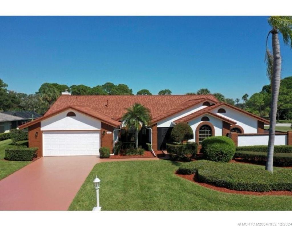 Photo of 1311 SW Cottonwood Cove, Port Saint Lucie, FL 34986 (MLS # M20047852)