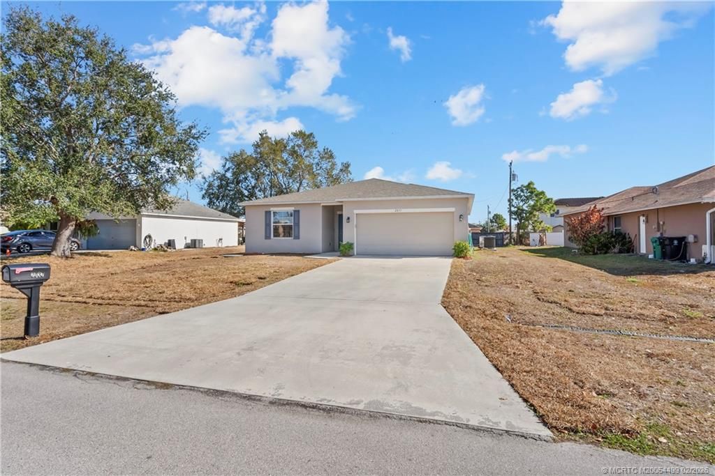Photo of 2037 SW Mcallister Lane, Port Saint Lucie, FL 34953 (MLS # M20054499)