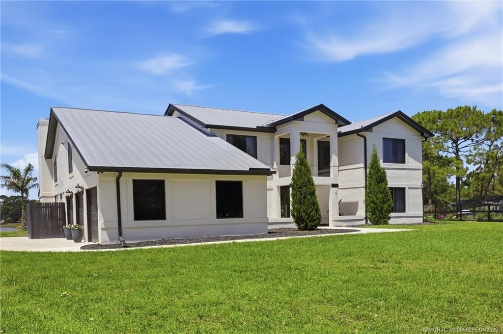 Photo of 9809 SW Malibu Terrace, Palm City, FL 34990 (MLS # M20055295)