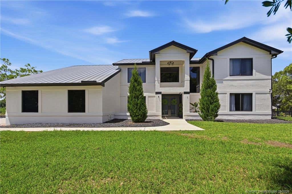 Photo of 9809 SW Malibu Terrace, Palm City, FL 34990 (MLS # M20055295)