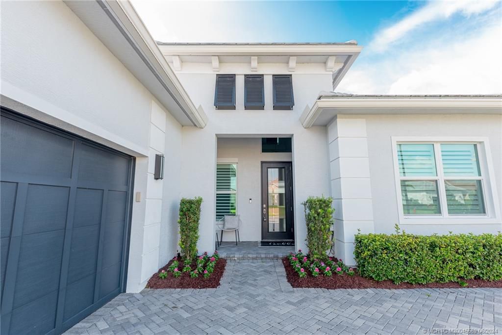 Photo of 8723 SW Flutto Way, Port Saint Lucie, FL 34987 (MLS # M20045569)