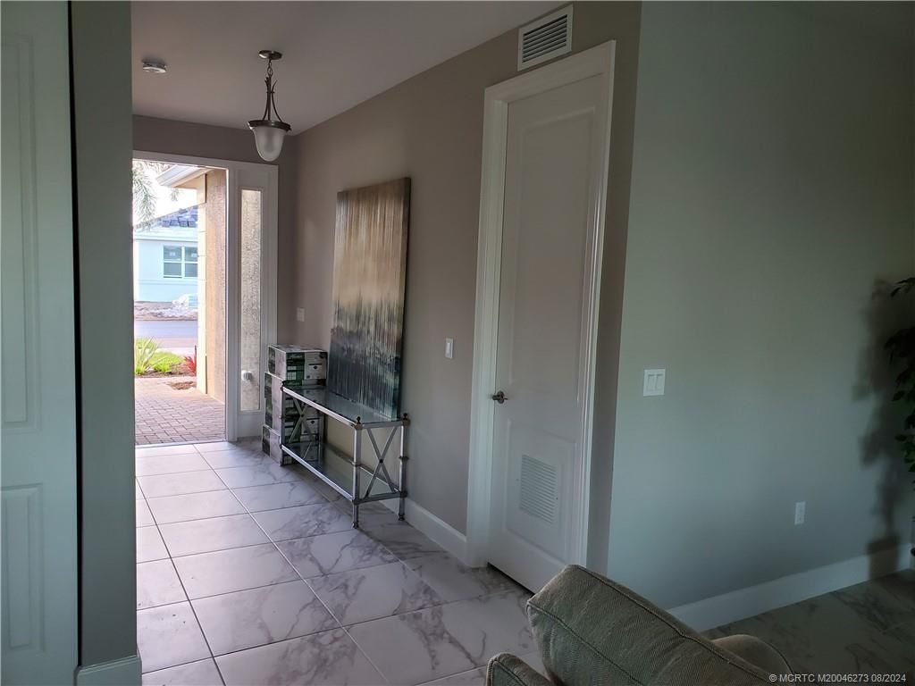 Photo of 11826 SW Oceanus Boulevard SW, Port Saint Lucie, FL 34987 (MLS # M20046273)