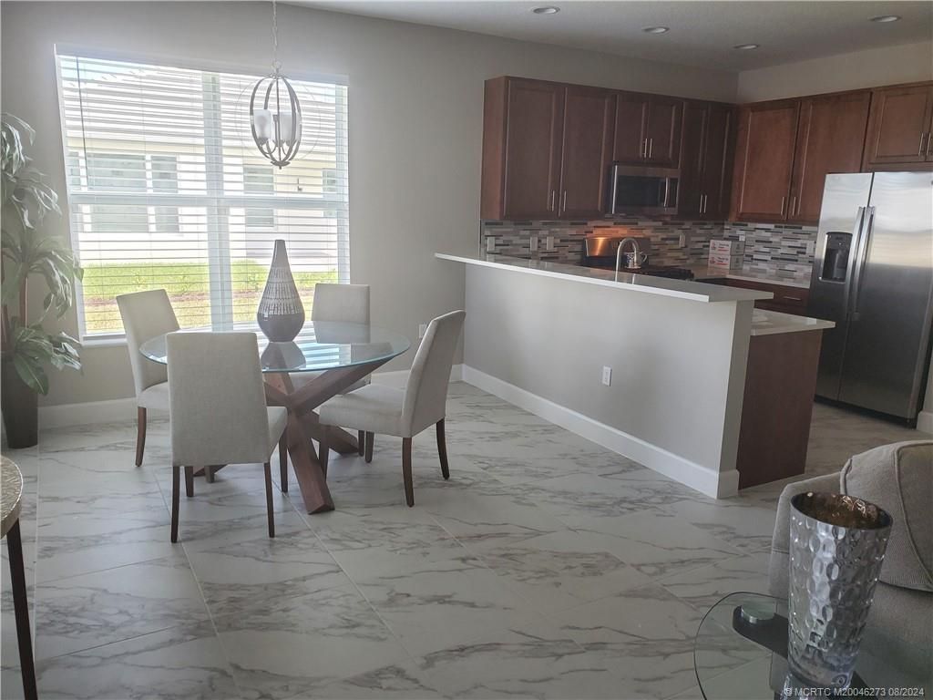 Photo of 11826 SW Oceanus Boulevard SW, Port Saint Lucie, FL 34987 (MLS # M20046273)