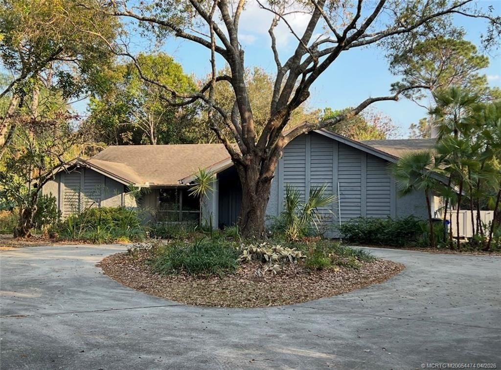 Photo of 1900 SW Crane Creek Avenue, Palm City, FL 34990 (MLS # M20054474)