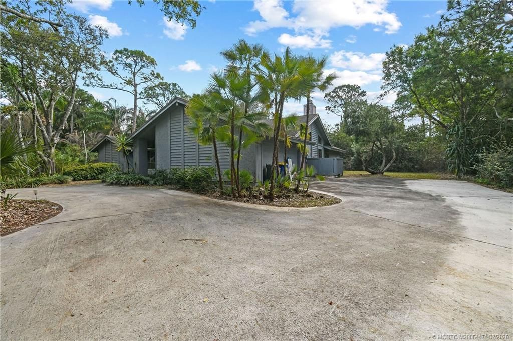 Photo of 1900 SW Crane Creek Avenue, Palm City, FL 34990 (MLS # M20054474)