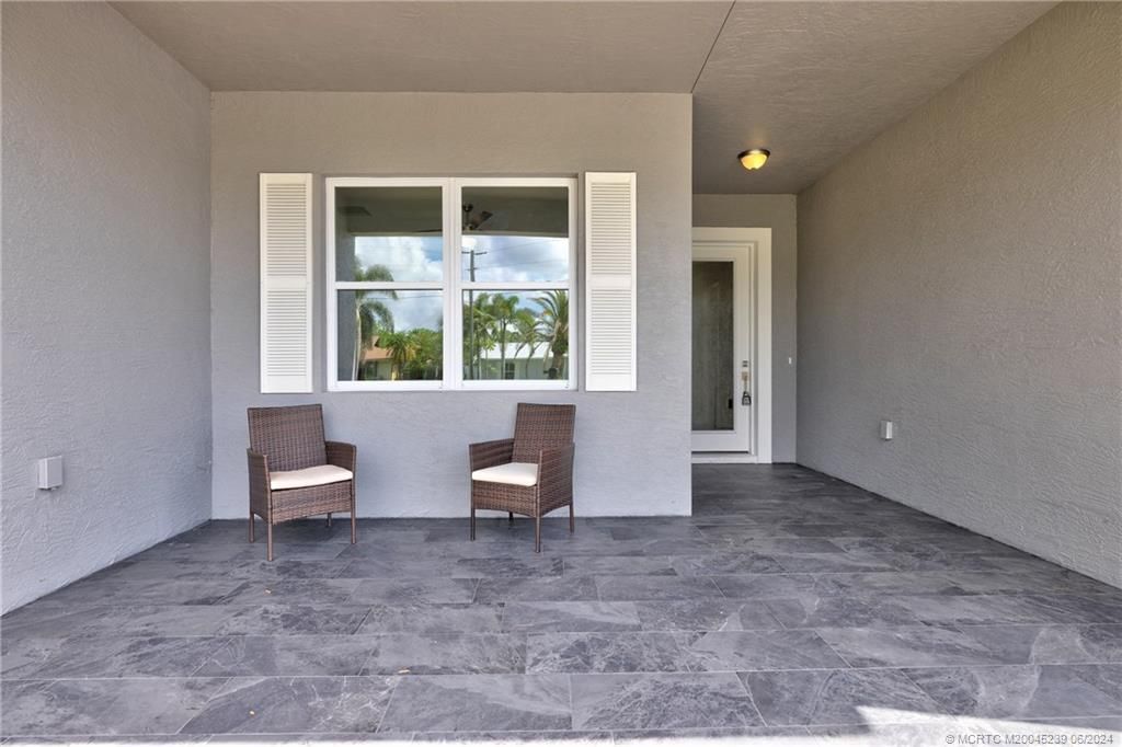 Photo of 1171 SE Palm Beach Road, Port Saint Lucie, FL 34952 (MLS # M20045239)