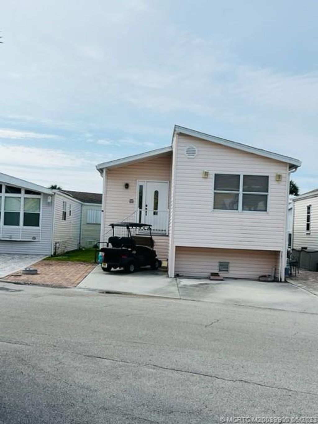 Photo of 343 Nettles Boulevard, Jensen Beach, FL 34957 (MLS # M20039900)