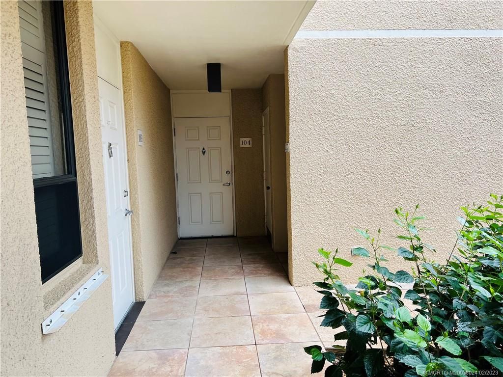 Photo of 3432 NE Causeway Blvd. #104, Jensen Beach, FL 34957 (MLS # M20038024)