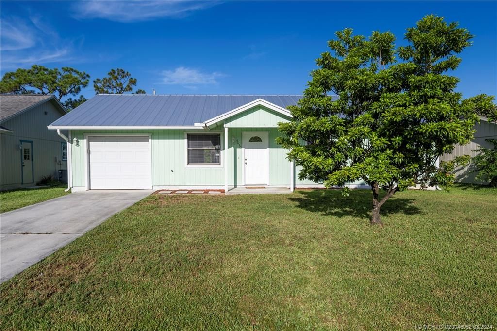 Photo of 5610 SE Normandy Avenue, Stuart, FL 34997 (MLS # M20046052)