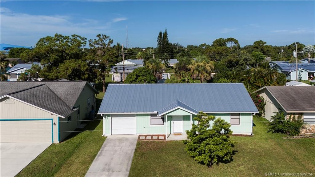 Photo of 5610 SE Normandy Avenue, Stuart, FL 34997 (MLS # M20046052)