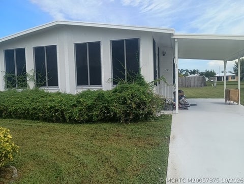 Photo of 19 Arboles Del Norte, Fort Pierce, FL 34951 (MLS # M20057375)