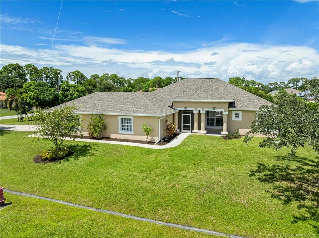 Photo of 1781 SW Whipple Avenue, Port Saint Lucie, FL 34953 (MLS # M20051830)