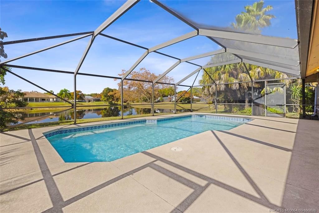 Photo of 3074 NE Loquat Lane, Jensen Beach, FL 34957 (MLS # M20054203)