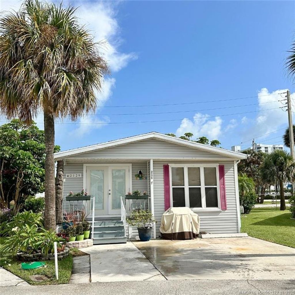 Photo of 2129 Nettles Boulevard, Jensen Beach, FL 34957 (MLS # M20051272)