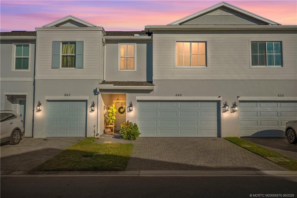 Photo of 649 NE Waters Edge Lane, Port Saint Lucie, FL 34983 (MLS # M20055875)