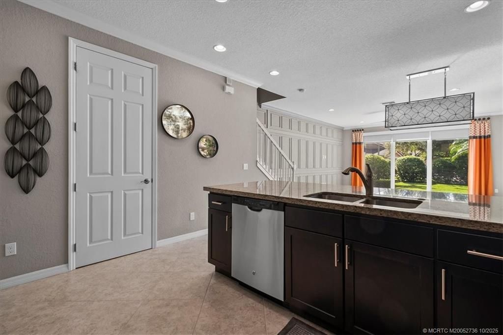 Photo of 692 SW Glen Crest Way, Stuart, FL 34997 (MLS # M20052736)