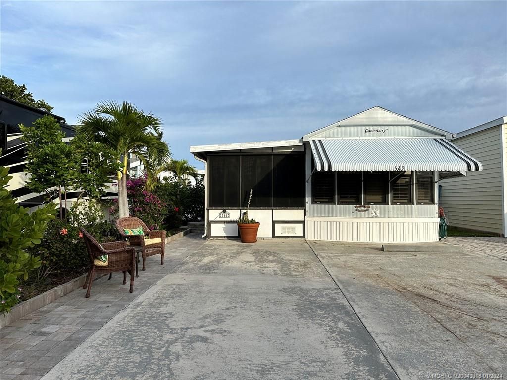 Photo of 542 Nettles Boulevard, Jensen Beach, FL 34957 (MLS # M20043018)