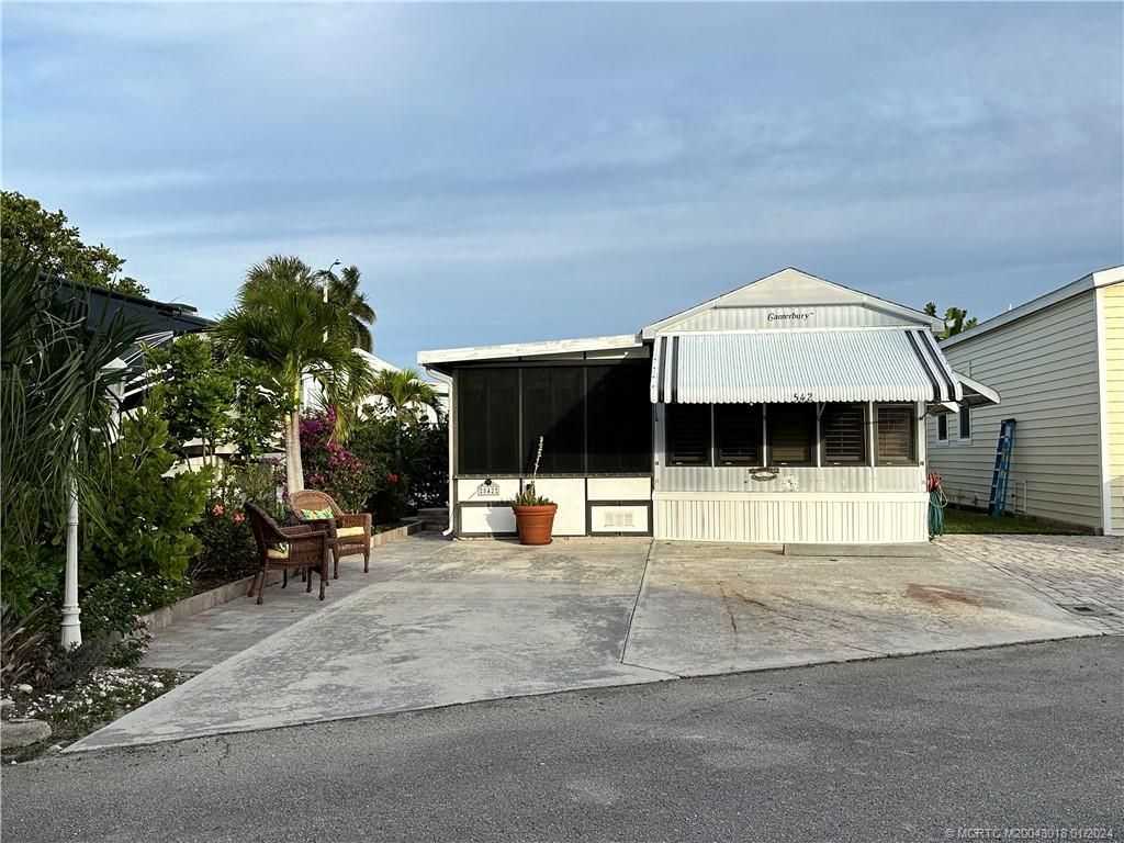 Photo of 542 Nettles Boulevard, Jensen Beach, FL 34957 (MLS # M20043018)