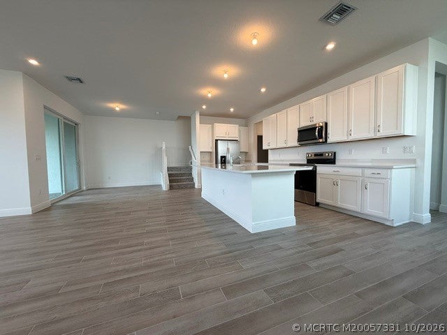 Photo of 1439 NW Corteal Way, Jensen Beach, FL 34957 (MLS # M20057331)