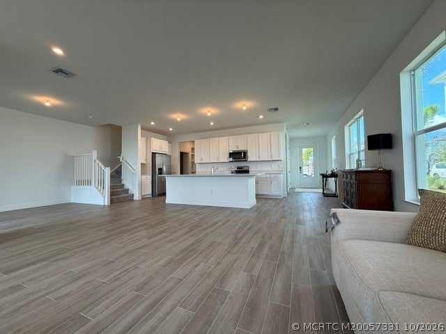 Photo of 1439 NW Corteal Way, Jensen Beach, FL 34957 (MLS # M20057331)
