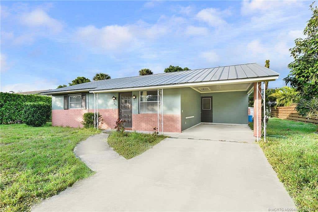 Photo of 815 SE Stypmann Boulevard, Stuart, FL 34994 (MLS # M20048199)