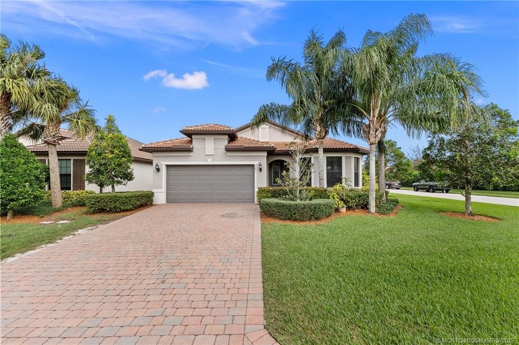 Photo of 581 SE Monet Drive, Port Saint Lucie, FL 34984 (MLS # M20049195)