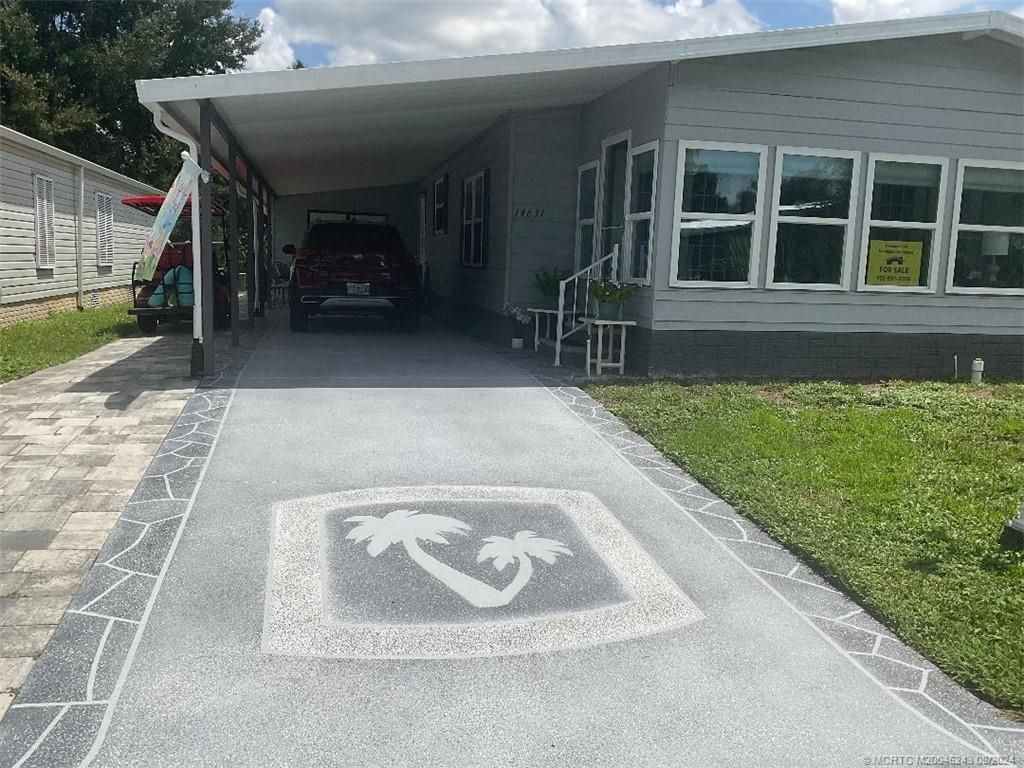 Photo of 14631 SW Divot Drive, Indiantown, FL 34956 (MLS # M20046243)