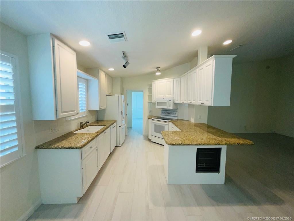 Photo of 781 SW Balmoral Trace, Stuart, FL 34997 (MLS # M20056217)